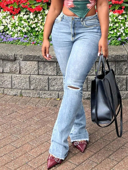 Flare-jeans med sliten knädetalj, bild 2